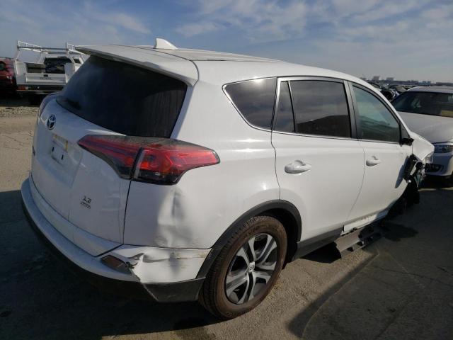 Photo 3 from auction – 2018 TOYOTA RAV4 LE with VIN 2T3BFREV2JW764526