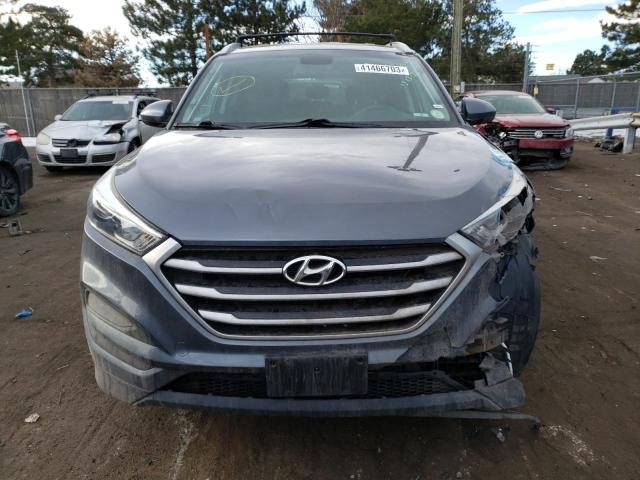 Photo 5 from auction – 2018 HYUNDAI TUCSON SEL with VIN KM8J3CA43JU640952