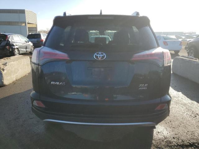 Photo 6 from auction – 2017 TOYOTA RAV4 XLE with VIN JTMRFREV1HJ710397