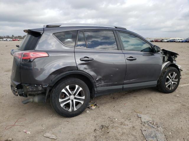 Photo 3 from auction – 2018 TOYOTA RAV4 LE with VIN JTMZFREV2JJ726064