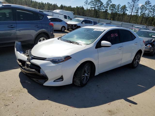 TOYOTA COROLLA L 2017 with VIN 5YFBURHE9HP624480 - Photo from auction