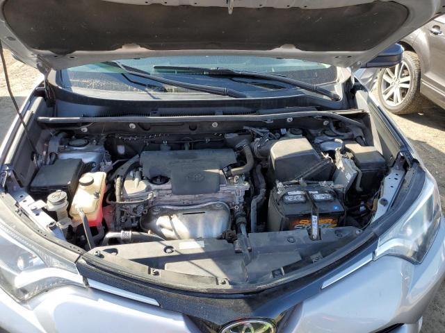 Photo 11 from auction – 2018 TOYOTA RAV4 LE with VIN 2T3ZFREV4JW441738