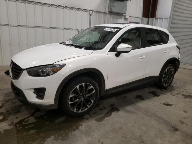 MAZDA CX-5 GT 2016 with VIN JM3KE4DY2G0748607 - Photo from auction