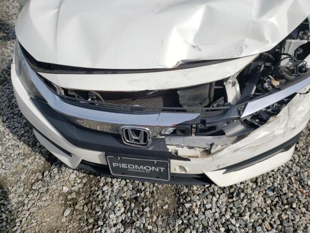 Photo 11 from auction – 2017 HONDA CIVIC LX with VIN 2HGFC2F56HH552210
