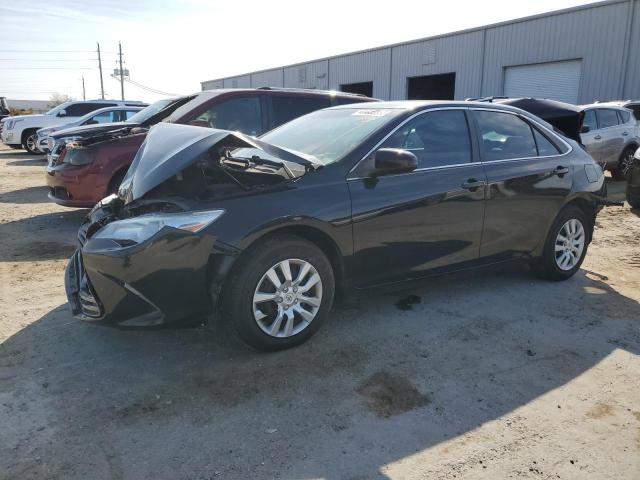 TOYOTA CAMRY LE 2016 with VIN 4T1BF1FK1GU584834 - Photo from auction