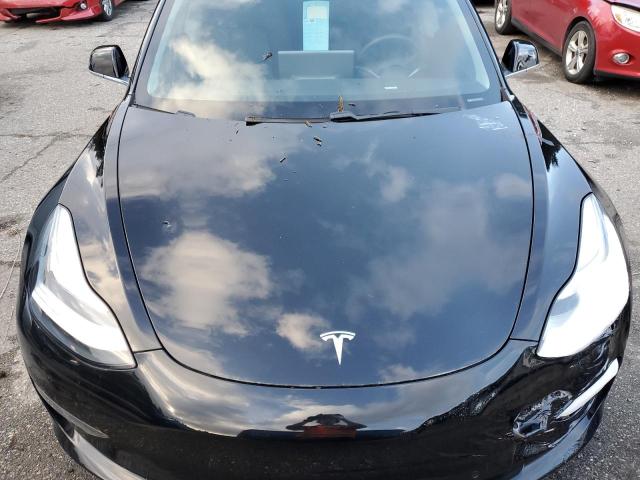 Photo 11 from auction – 2019 TESLA MODEL 3 with VIN 5YJ3E1EAXKF301112