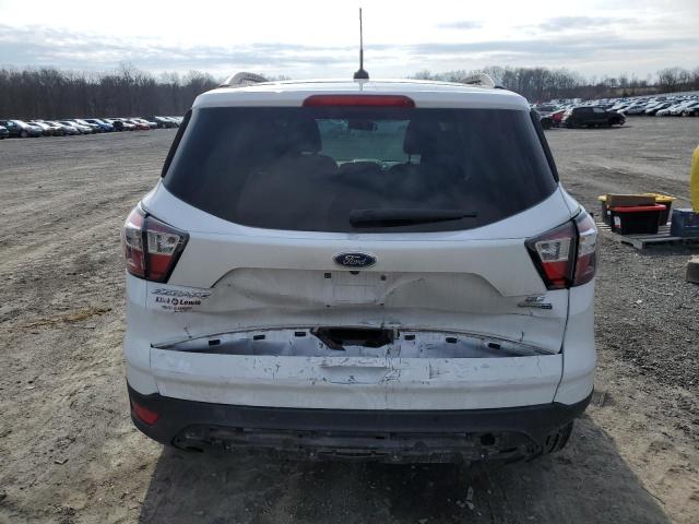 Photo 6 from auction – 2017 FORD ESCAPE SE with VIN 1FMCU9GD0HUA17878