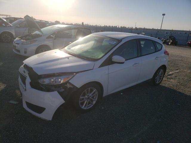 FORD FOCUS SE 2018 with VIN 1FADP3K29JL295327 - Photo from auction