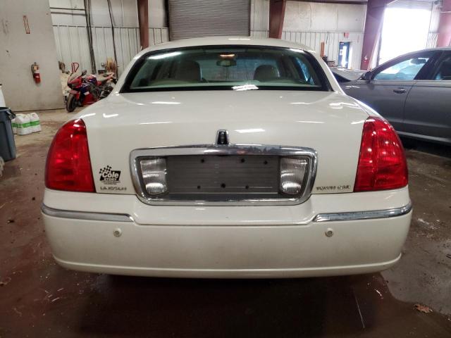 Photo 6 from auction – 2004 LINCOLN TOWN CAR E with VIN 1LNHM81W84Y674277