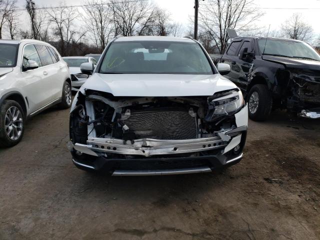 Photo 5 from auction – 2021 HONDA PILOT TOUR with VIN 5FNYF6H64MB018358