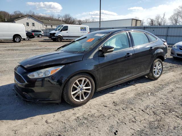FORD FOCUS SE 2016 with VIN 1FADP3F21GL240969 - Photo from auction