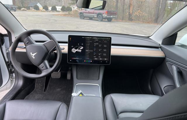 Photo 9 from auction – 2021 TESLA MODEL 3 with VIN 5YJ3E1EB4MF915441