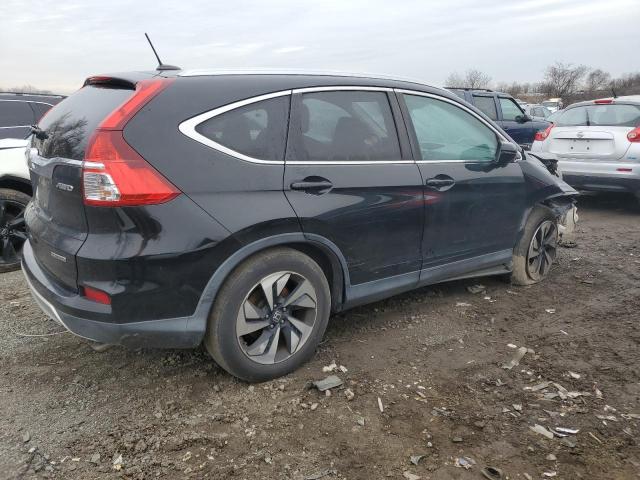 Photo 3 from auction – 2016 HONDA CR-V TOURI with VIN 5J6RM4H99GL022135
