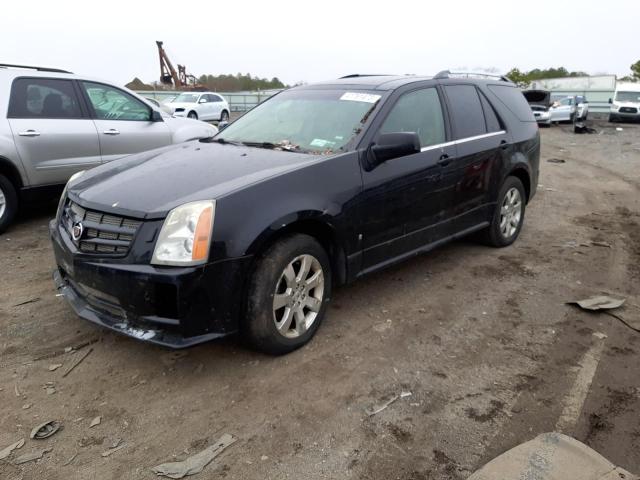 CADILLAC SRX 2009 with VIN 1GYEE437590110671 - Photo from auction