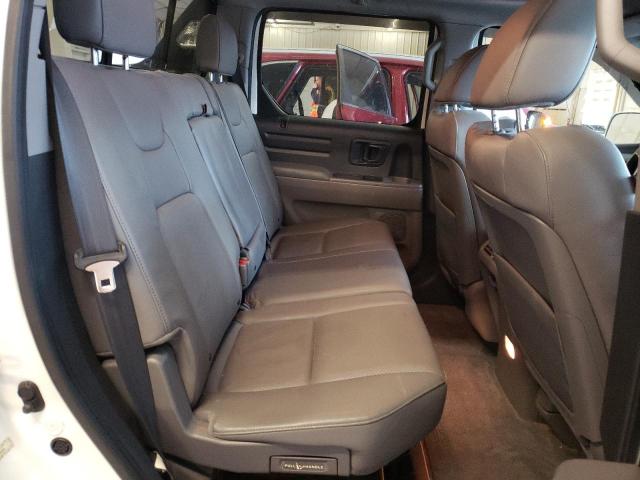 Photo 10 from auction – 2014 HONDA RIDGELINE with VIN 5FPYK1F53EB002699