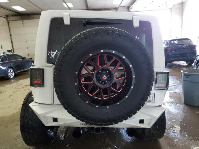 Photo 6 from auction – 2013 JEEP WRANGLER U with VIN 1C4HJWDG7DL670160