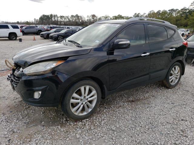 HYUNDAI TUCSON GLS 2012 with VIN KM8JUCAC9CU424546 - Photo from auction