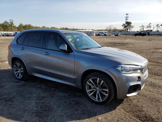 Photo 4 from auction – 2014 BMW X5 XDRIVE5 with VIN 5UXKR6C54E0C03877