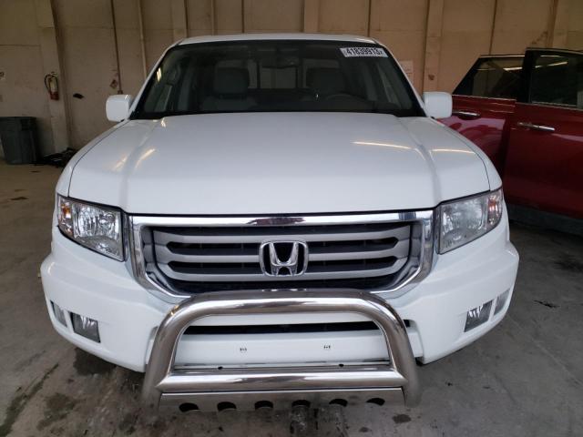 Photo 5 from auction – 2014 HONDA RIDGELINE with VIN 5FPYK1F53EB002699