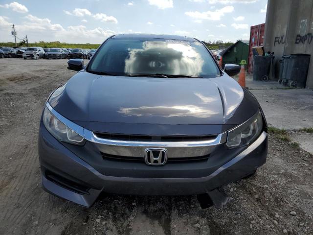 Photo 5 from auction – 2018 HONDA CIVIC EX with VIN 19XFC2F78JE025741