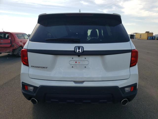 Photo 6 from auction – 2022 HONDA PASSPORT E with VIN 5FNYF7H54NB001879