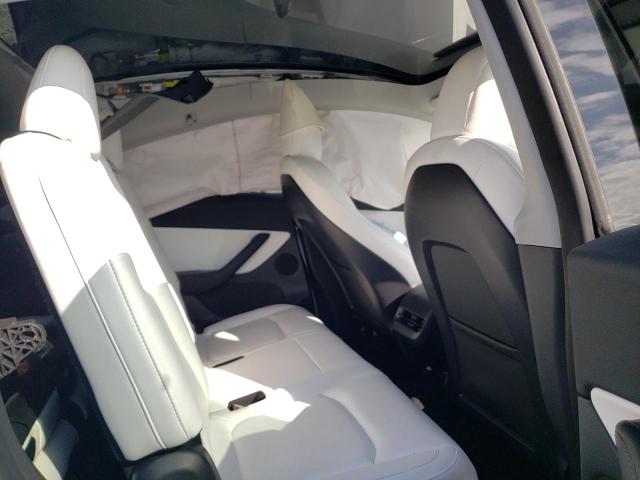 Photo 11 from auction – 2022 TESLA MODEL Y with VIN 7SAYGAEE3NF325827
