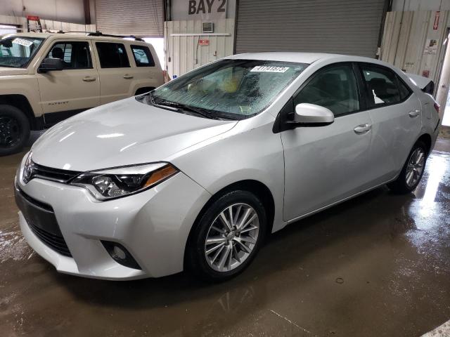 TOYOTA COROLLA L 2015 with VIN 2T1BURHE9FC305819 - Photo from auction