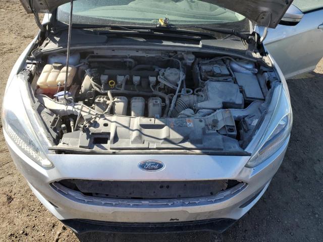 Photo 11 from auction – 2015 FORD FOCUS SE with VIN 1FADP3F29FL341059