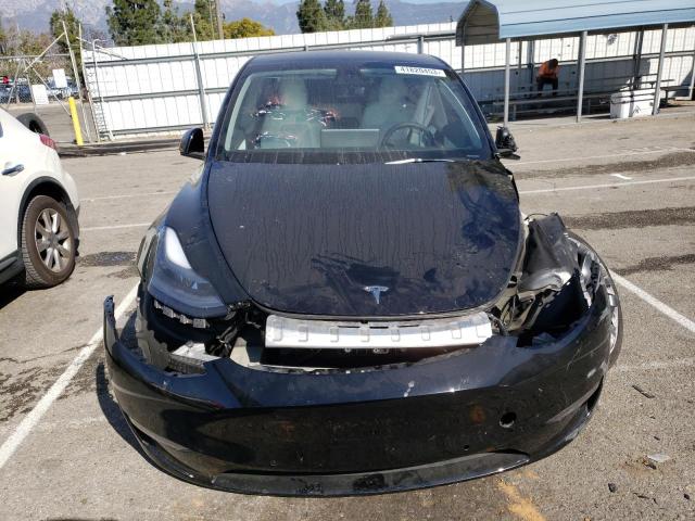 Photo 5 from auction – 2022 TESLA MODEL Y with VIN 7SAYGDEF5NF346057