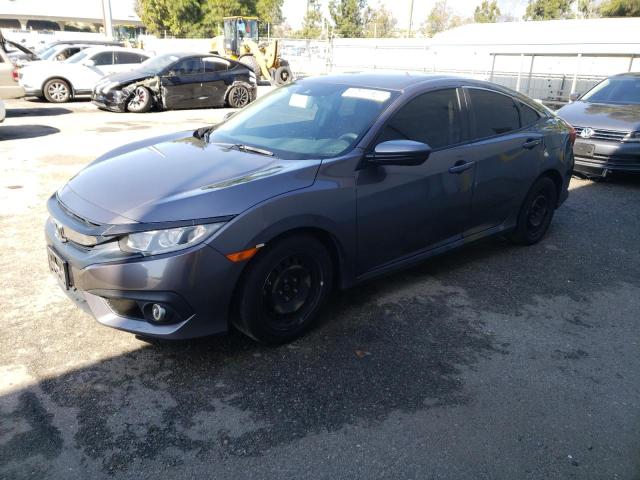 HONDA CIVIC LX 2018 with VIN 2HGFC2F60JH529536 - Photo from auction