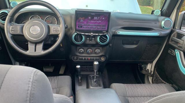 Photo 9 from auction – 2011 JEEP WRANGLER U with VIN 1J4BA5H19BL597855