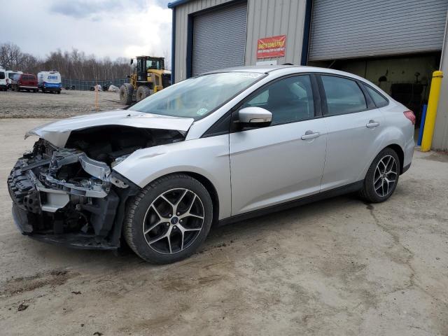 FORD FOCUS SE 2017 with VIN 1FADP3FEXHL289034 - Photo from auction