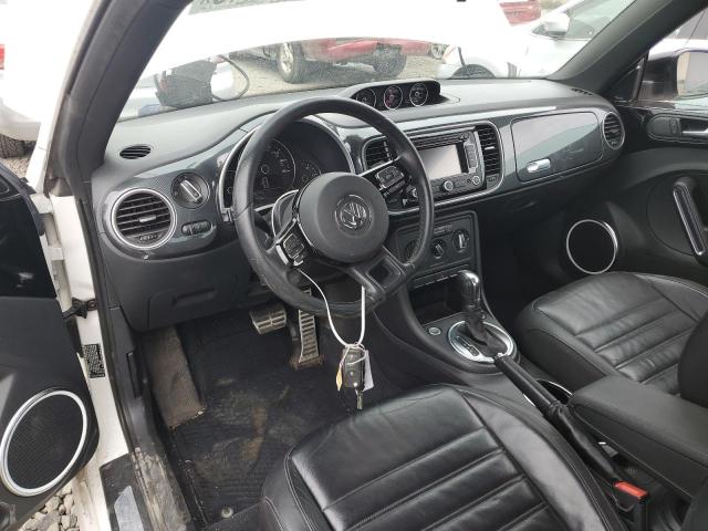 Photo 8 from auction – 2012 VOLKSWAGEN BEETLE TUR with VIN 3VWVA7AT8CM644879