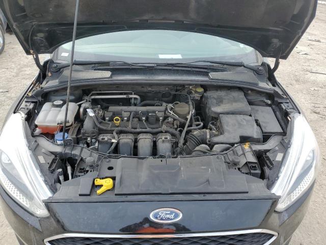 Photo 11 from auction – 2015 FORD FOCUS SE with VIN 1FADP3F21FL367235