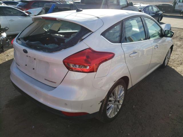 Photo 3 from auction – 2016 FORD FOCUS TITA with VIN 1FADP3N29GL271551