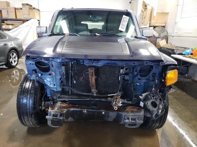 Photo 5 from auction – 2007 HUMMER H3 with VIN 5GTDN13E678102939