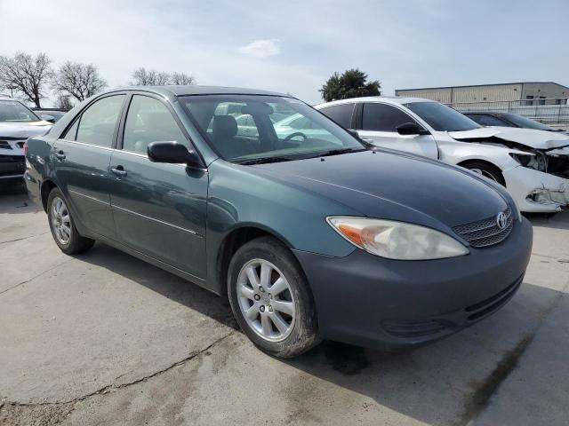 Photo 4 from auction – 2002 TOYOTA CAMRY LE with VIN JTDBE30K020126942