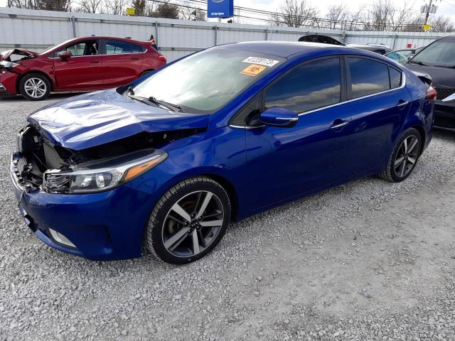 KIA FORTE EX 2017 with VIN 3KPFL4A8XHE128214 - Photo from auction