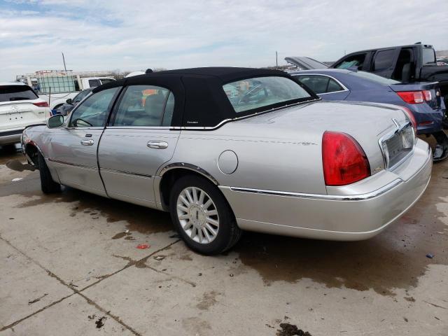 Photo 2 from auction – 2003 LINCOLN TOWN CAR E with VIN 1LNHM81W53Y706472