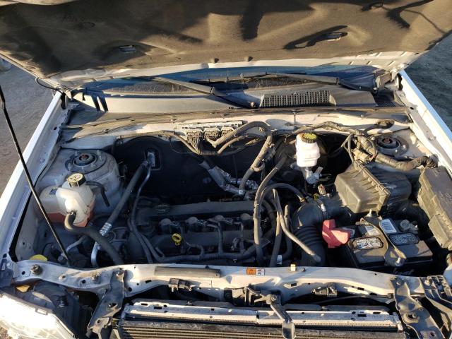 Photo 12 from auction – 2011 MAZDA TRIBUTE I with VIN 4F2CY0C76BKM03812