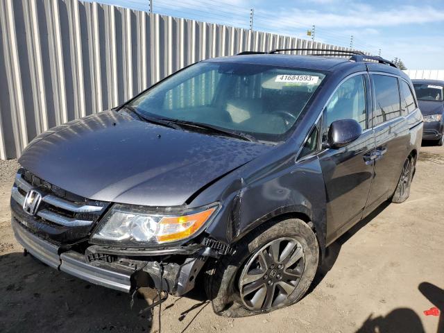 Photo 1 from auction – 2014 HONDA ODYSSEY TO with VIN 5FNRL5H98EB041872