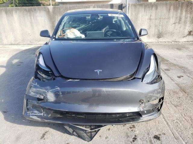 Photo 5 from auction – 2022 TESLA MODEL 3 with VIN 5YJ3E1EB0NF289937