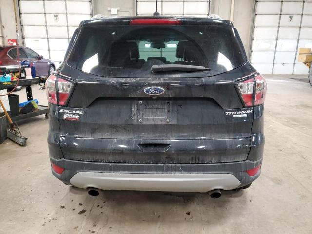Photo 6 from auction – 2017 FORD ESCAPE TIT with VIN 1FMCU9J93HUB62370