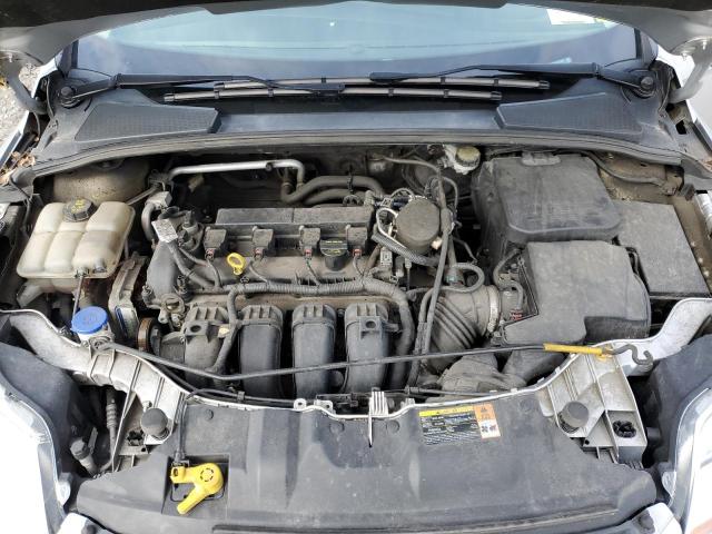 Photo 11 from auction – 2014 FORD FOCUS SE with VIN 1FADP3F20EL221357