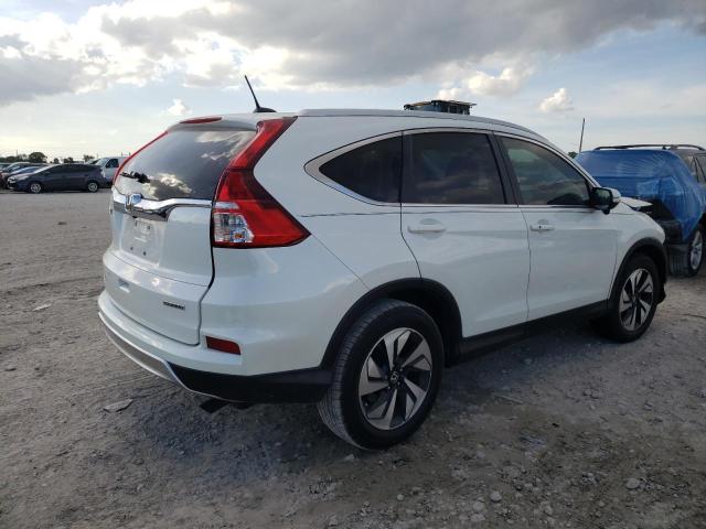 Photo 3 from auction – 2016 HONDA CR-V TOURI with VIN 5J6RM3H94GL005799