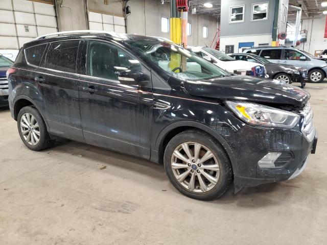 Photo 4 from auction – 2017 FORD ESCAPE TIT with VIN 1FMCU9J93HUB62370