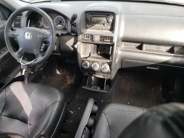 Photo 8 from auction – 2002 HONDA CR-V LX with VIN JHLRD68472C013838