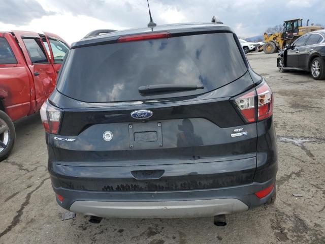 Photo 6 from auction – 2018 FORD ESCAPE SE with VIN 1FMCU9GD4JUC12467