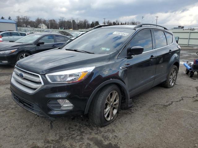 FORD ESCAPE SE 2018 with VIN 1FMCU9GD4JUC12467 - Photo from auction
