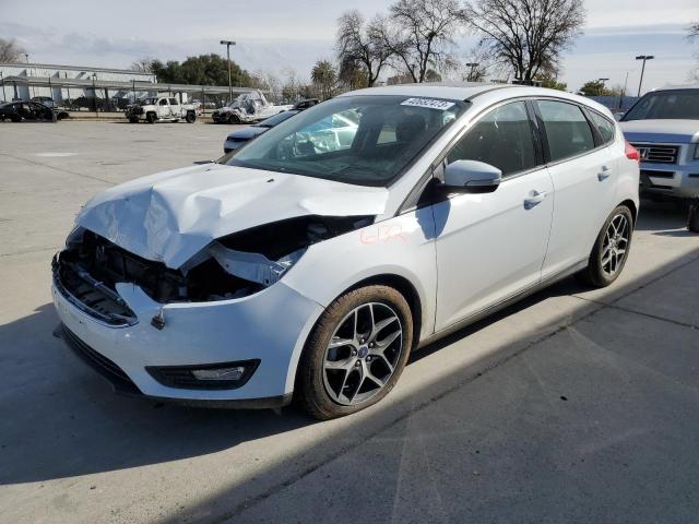 FORD FOCUS SEL 2018 with VIN 1FADP3M2XJL217717 - Photo from auction